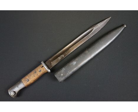 A Mauser K98 Bayonet With Wooden Grip And 1944 dated scabbard 