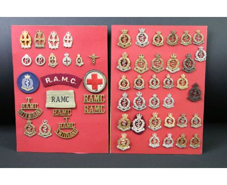 A collection of Kings and Queens crown British and Commonwealth Royal Army Medical Corps cap and collar badges to include Vol