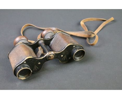 A pair of British military issued binoculars by Ross of London, marked with the British broad arrow. 