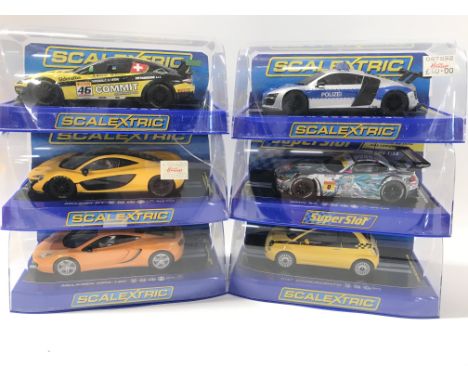 6 Boxed Scalextric Cars. A Maserati Trofeo. A Audi R8. A McLaren P1. A BMW z4. A McLaren MP4-12C And A Fiat Cinquecento.