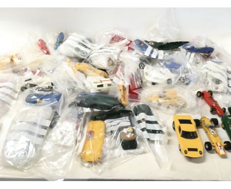 A collection of Scalextric cars..parts and accessories. No reserve