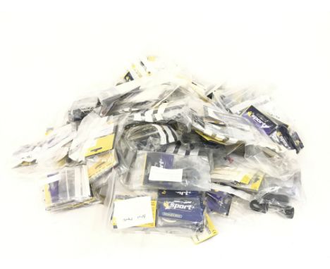 A box containing a large quantity of spare Scalextric parts. Mostly bagged and new. No reserve.
