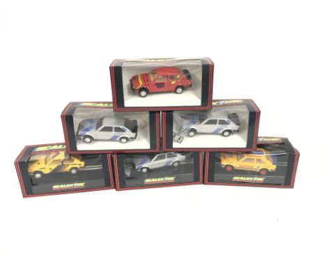 6 boxed Scalextric cars. All Ford escorts with some various decals. No reserve.