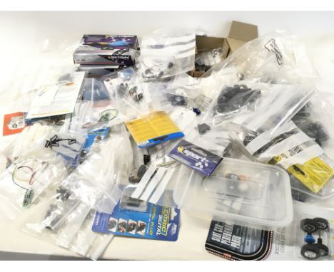 A large collection of spare parts and accessories for Scalextric cars. No reserve
