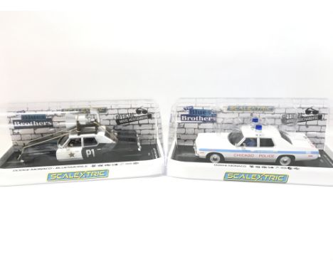 A Boxed Scalextric Blues Brothers Dodge Monaco-Bluesmobile and A Dodge Monaco.
