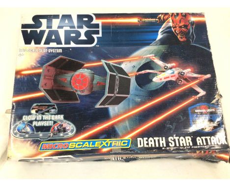 A boxed STAR WARS micro Scalextric set DEATH STAR ATTACK. No reserve