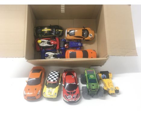 A collection of 11 Scalextric cars suitable for repair or spares.