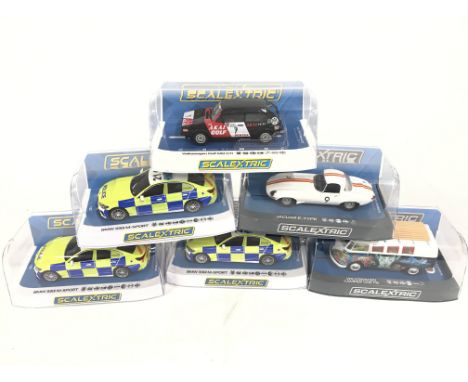 6 boxed Scalextric to include 3 Police BMW 330 M.SPORT. Jaguar Etype. Volkswagen camper van. Volkswagen Golf GTI. no reserve.