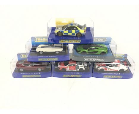 6 boxed Scalextric cars. To include Maserati Trofeo. Audi R8. Aston Martin DBS. Jaguar D-type. McLaren P1. Subaru Impreza. No