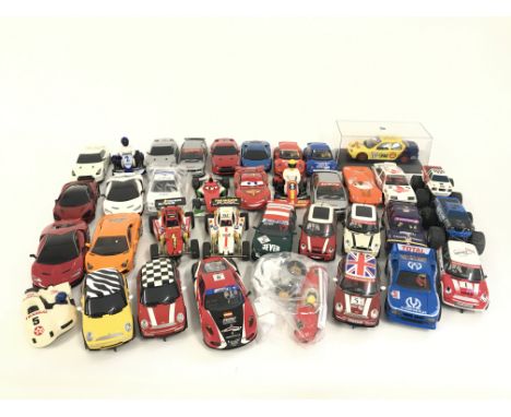 A box containing a large collection of used Scalextric cars. Approximately 60 cars. No reserve.