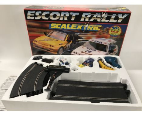 A boxed Escort Rally Scalextric set. No reserve.