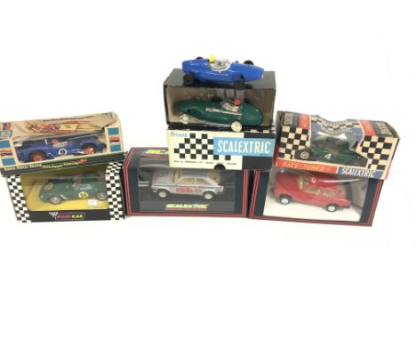 A collection of 7 Scalextric cars. Including some vintage examples. No reserve.