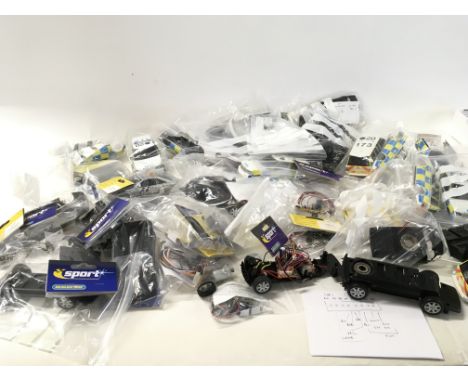 A collection of Scalextric Cars spare parts and accessories. No reserve
