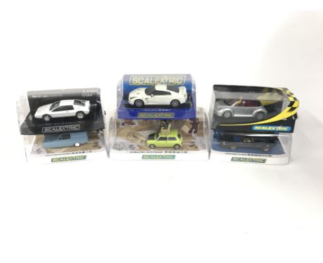 6 boxed Scalextric cars to include Mr Bean Mini. Mr Bean Reliant Supervan.Nissan GTR. Lotus Esprit. VW beetle. No reserve.