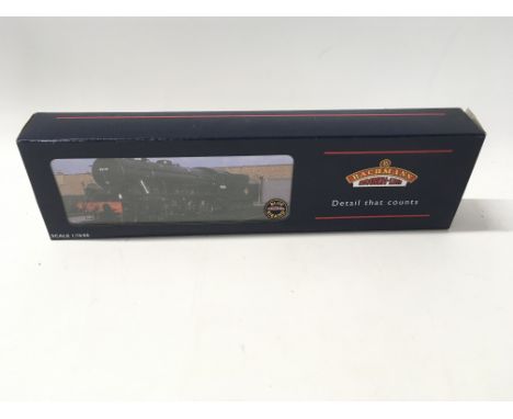 A boxed model 00 gauge locomotive with tender by Bachmann no. 32.255 07WD 2.8.0. Austerity WD 21 Army Transport Group 78697. 