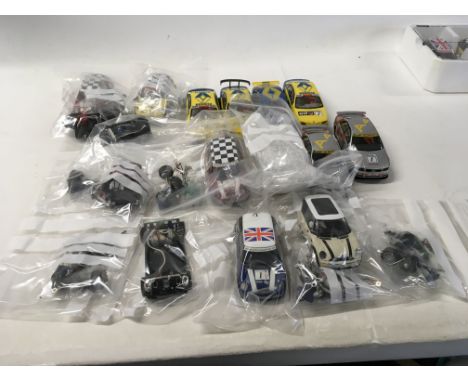 A collection of Scalextric cars ..spare parts and accessories. No reserve
