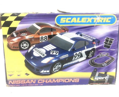 A Boxed Scalextric Nissan Champions Set. No Reserve.