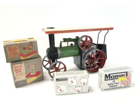 A Mamod Steam Tractor. A Boxed model power Hammer and a boxed miniature Grinding Machine.