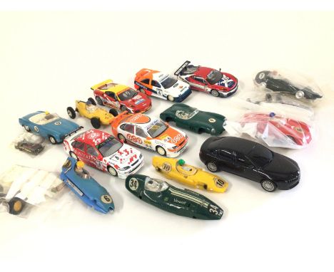 A Box Containing Scalextric parts and Spares.