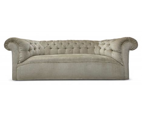 Chesterfield shaped button-tufted sofa, upholstered in pale beige velvet fabric with rolled arms, decorative rope trim and ru
