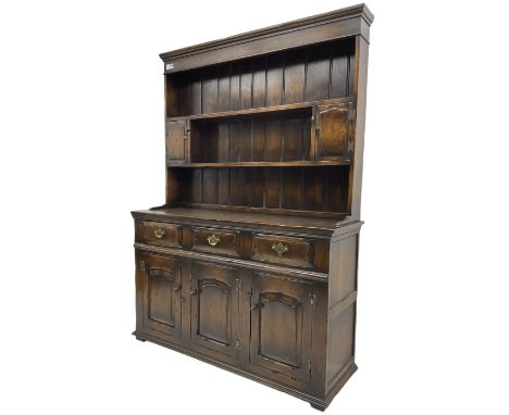 Georgian design oak dresser, the two-tier plate rack with two flanking spice cupboards, the base fitted with three drawers ov