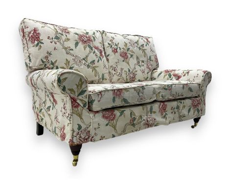 Steed Upholstery - 'Knightsbridge' two seater sofa, upholstered in cream fabric with pink and green floral design, loose back
