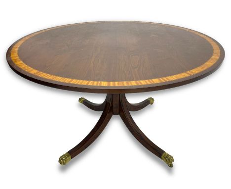 Georgian design inlaid chestnut wood centre table, the circular tilt-top inlaid with satinwood banding, gun barrel turned ped