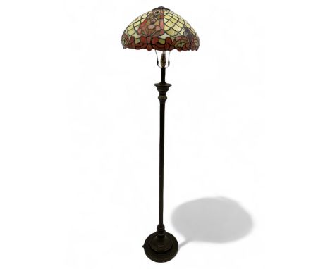 Early 20th century Tiffany design floor lamp, stained glass shade with floral and geometric motifs, turned metal column termi