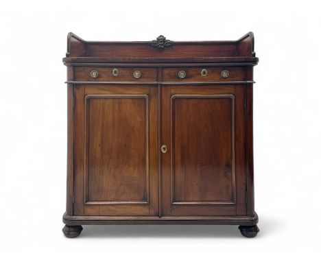 19th century mahogany chiffonier side cabinet, raised back with central floral carving, fitted with two drawers over double p