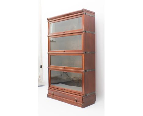 A mahogany Globe Wernicke glass-fronted bookcase - 1920s, with four glazed bookcase sections and a base with full-width ogee 