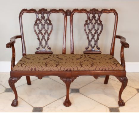 A George II style mahogany chair back settee - late 20th century, in the Chippendale manner, the double chair back with folia