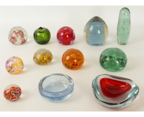 A small collection of glass paperweights - including two two Victorian dumps; a Caithness Crucible paperweight; three bubble 