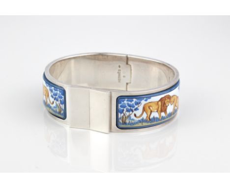 An Hermes silver and enamel bangle - stamped 'HERMES B' with French control marks, the broad band with two inset enamel panel