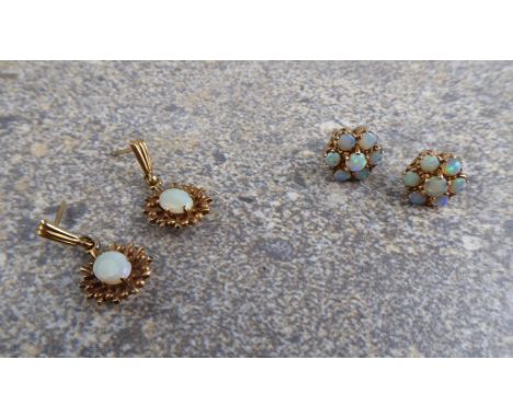 Two pairs of 9ct gold and opal earrings - both British hallmarked, comprising a pair of floral cluster earrings, 11.5mm diame