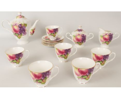 A Kirsty Jane China bone china tea service - comprising six tea cups and saucers, teapot, milk jug and covered two-handled su