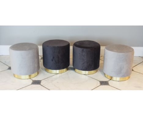 A set of four drum-form stools - modern, upholstered in dark and light grey (two of each), on gilt bases, 38 cm diameter, 40 