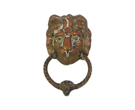 A Georgian style brass lion mask and loose ring door knocker - 19.5 x 11 cm.