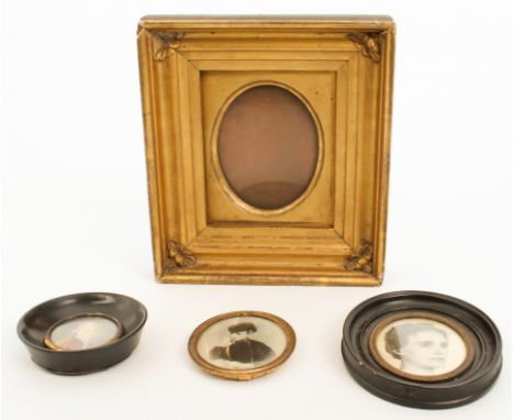 Three miniature portraits and a miniature frame: 1. a 19th century watercolour on card of a naval officer, 3.7 cm diameter, e