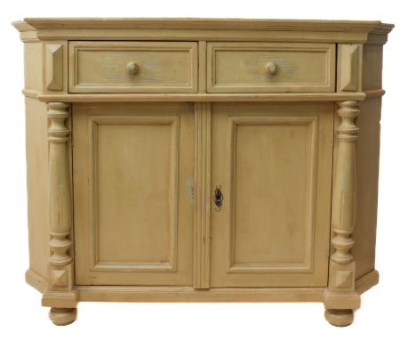 A painted pine corner cabinet: in distressed 'sand yellow', with two drawers over a pair of panelled cupboard doors enclosing