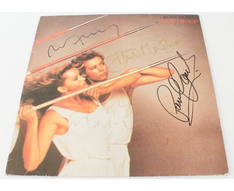 Vinyl / Autographs - Roxy Music - Flesh + Blood. Uk album clearly signed on front by 4 members: Bryan Ferry, Phil Manzanera, 