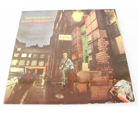 Vinyl / Autographs - David Bowie - Ziggy Stardust. German fully laminated gatefold album, signed in the centre by Spiders Of 