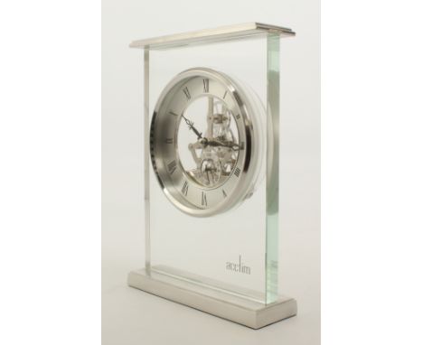 A boxed Acctim Cranfield Quartz skeleton mantel clock - with clear glass and polished alloy case, skeletonised silvered Roman