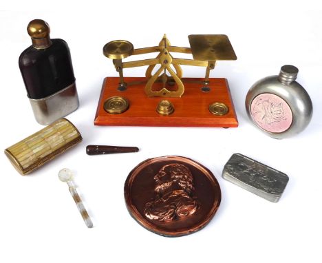 A set of postal scales, pewter snuff box with hunting scene, copper Shakespeare paper weight and a hip flask