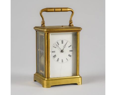 A FRENCH BRASS CASED STRIKING AND REPEATING CARRIAGE CLOCKNo. 4382, circa 1885The Corniche case with a bevelled oval glass to