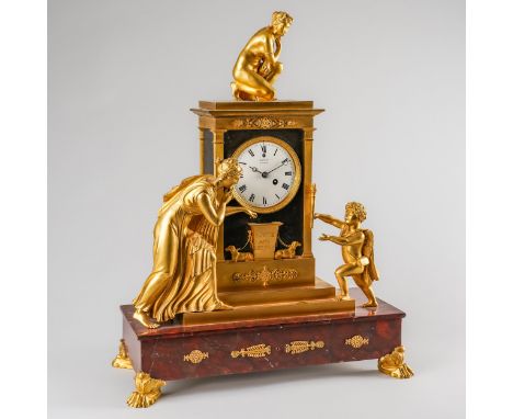 A RESTAURATION ORMOLU AND GRIOTTE MARBLE MANTEL TIMEPIECEThe movement by Barwise, London,The case surmounted by a model of th