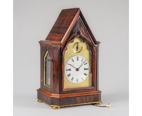 A FINE EARLY VICTORIAN GOTHIC REVIVAL ORMOLU-MOUNTED ROSEWOOD SMALL MANTEL CLOCKBy Charles Haley, LondonThe case with arched 