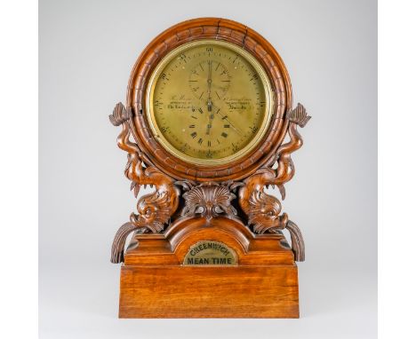 A VICTORIAN WALNUT REGULATORBy R. Morse, 8 Charing Cross, circa 1870The drum-shaped pediment supported by a pair of adorned d