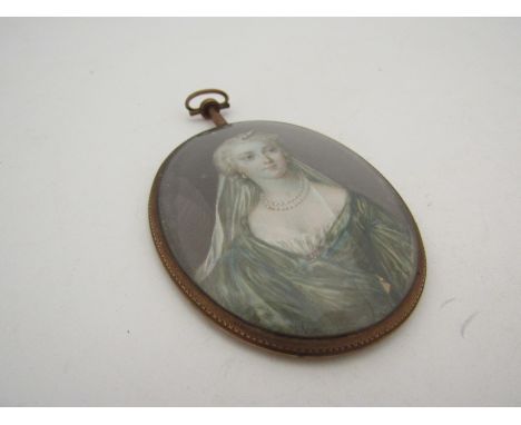 A late 19th Century portrait miniature on ivory of an elegant lady a/f    