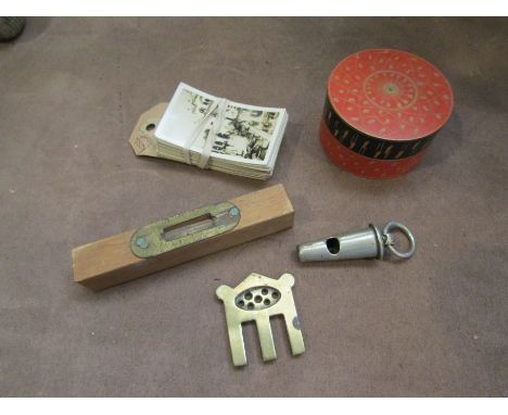 Bygones including whistle, purse, level, trinket pot and stereograph photos