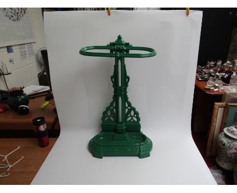 A Victorian cast iron stick stand painted green, 67cm x 38cm